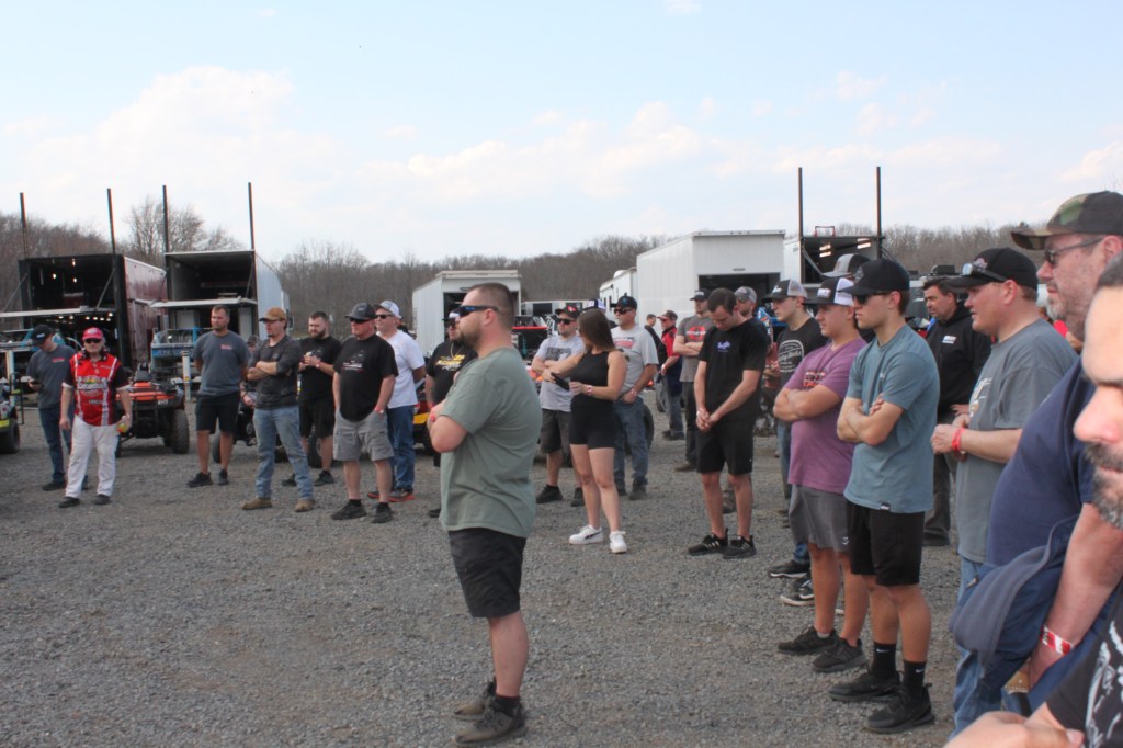 Driver's meeting before the start of the race in the pit area near the organizer's trailer